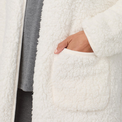 A lady wearing Midi Sherpa Cardi