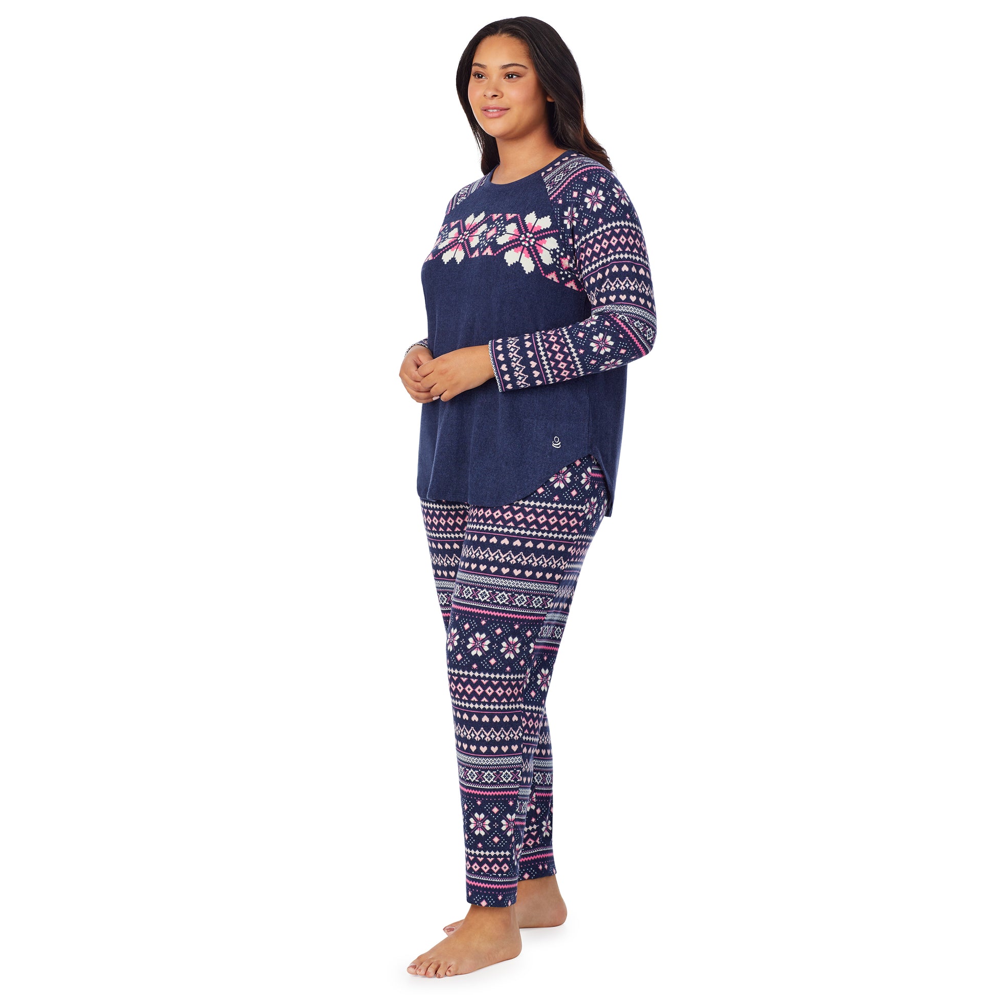 A lady wearing navy pink fairisle brushed sweater knit long sleeve plus pajama set.