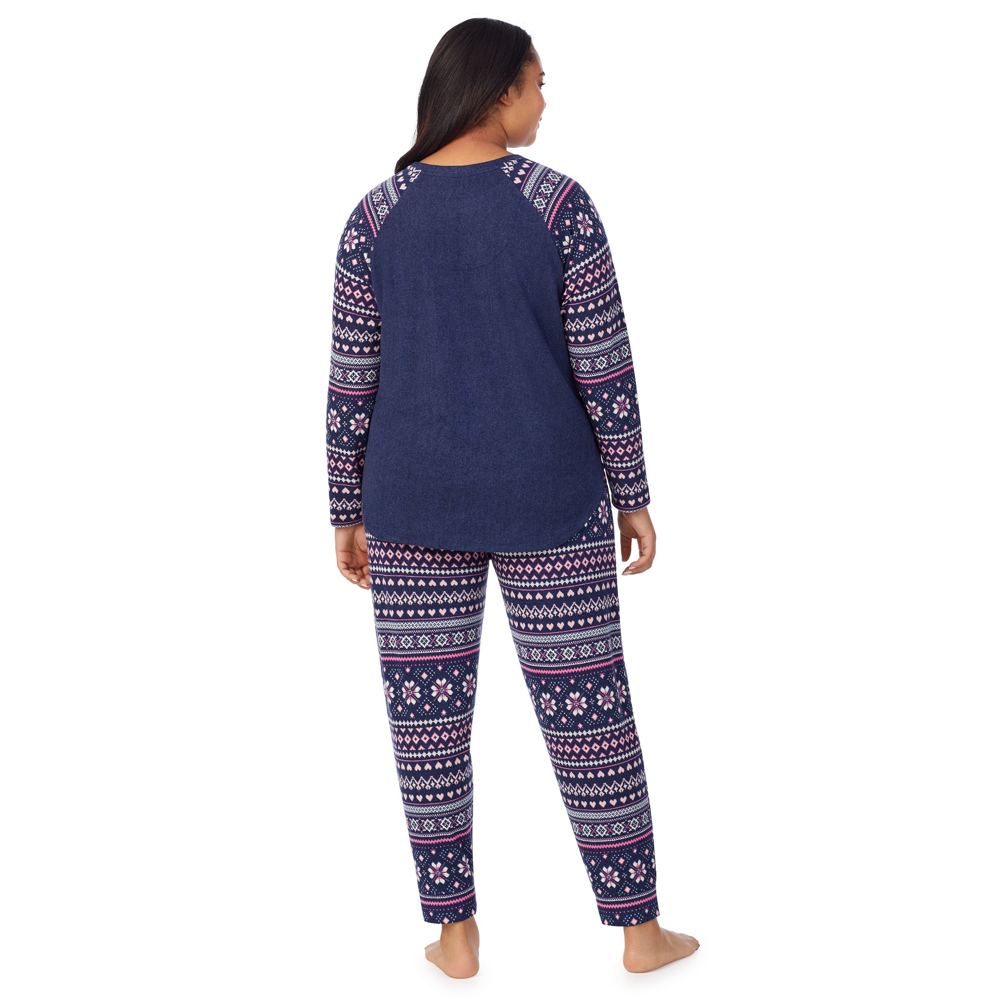 A lady wearing navy pink fairisle brushed sweater knit long sleeve plus pajama set.