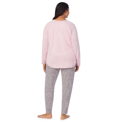 Animal with Pink;Model is wearing size 1X. She is 5'10", Bust 40", Waist 33", Hips 47"@A lady wearing animal with pink brushed sweater knit long sleeve plus pajama set. 