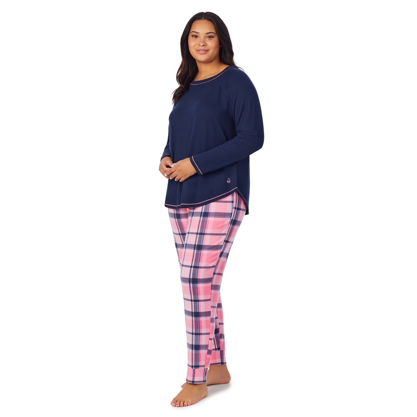 Pink Plaid;Model is wearing size 1X. She is 5'10", Bust 40", Waist 33", Hips 47"@A lady wearing pink plaid brushed sweater knit long sleeve plus pajama set. 