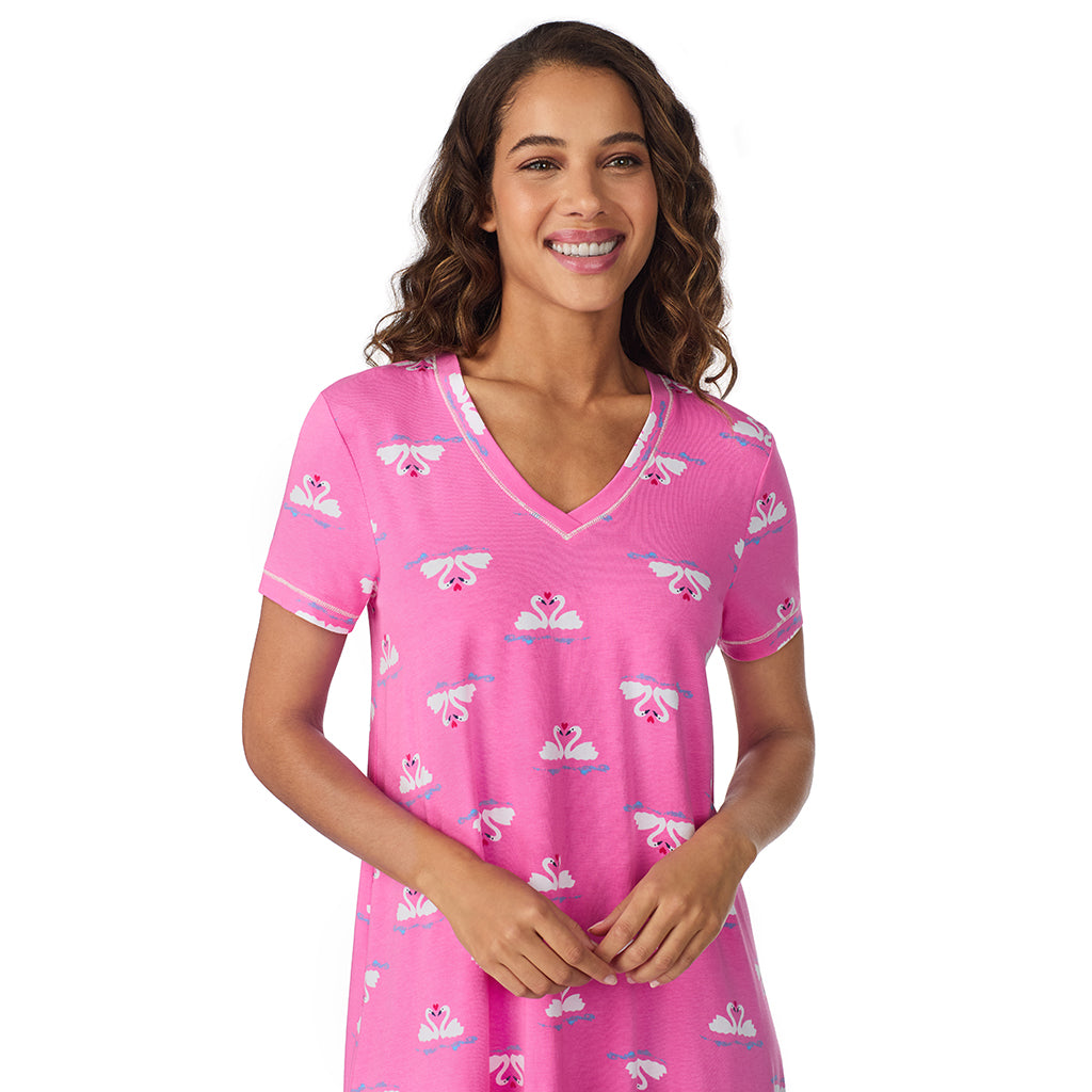 Pink Swans;Model is wearing size S. She is 5’9”, Bust 34”, Waist 23”, Hips 35”.@A lady wearing Pink Swans Cotton-Blend Short Sleeve Sleep Shirt