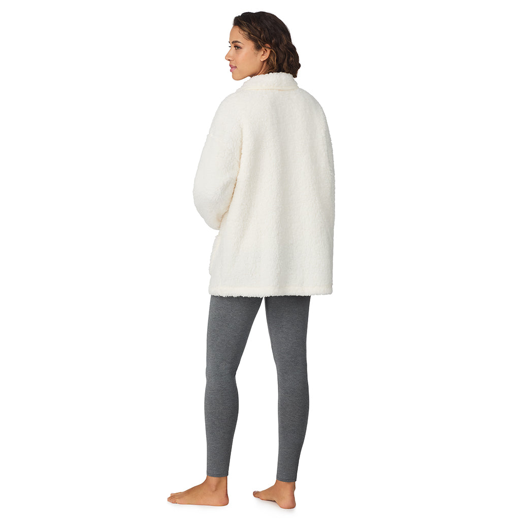 Ivory;Model is wearing size S. She is 5’9”, Bust 34”, Waist 23”, Hips 35”.@A lady wearing Ivory Snuggle Up Sherpa Cardi