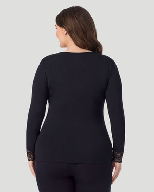 A plus size lady wearing black Softwear With Stretch Long Sleeve V-Neck With Lace PLUS in a back view pose