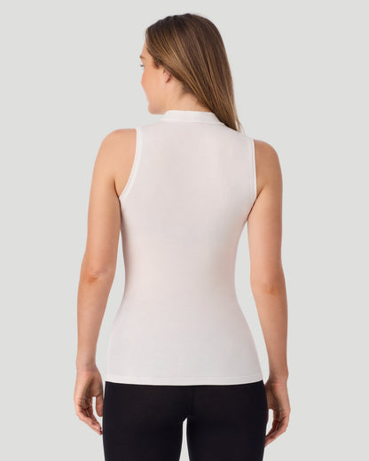 A lady wearing Softwear With Stretch Mock Neck Tank in ivory shown in a back view pose