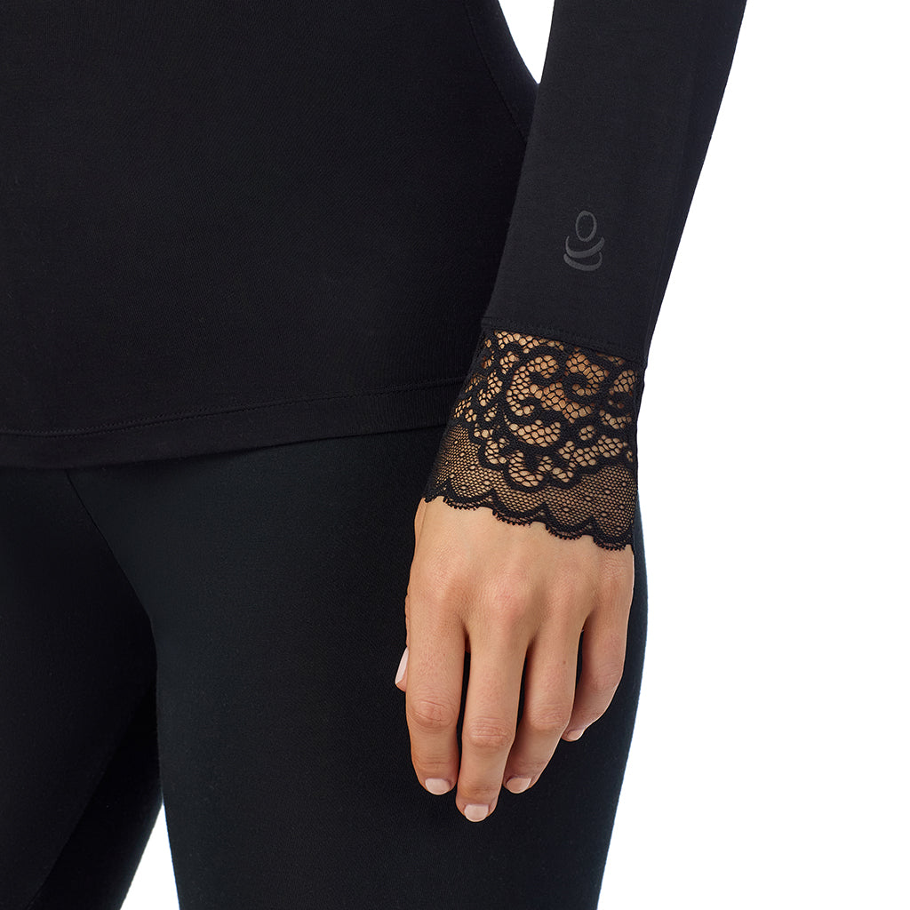 A lady is wearing Softwear With Stretch Long Sleeve V-Neck With Lace
