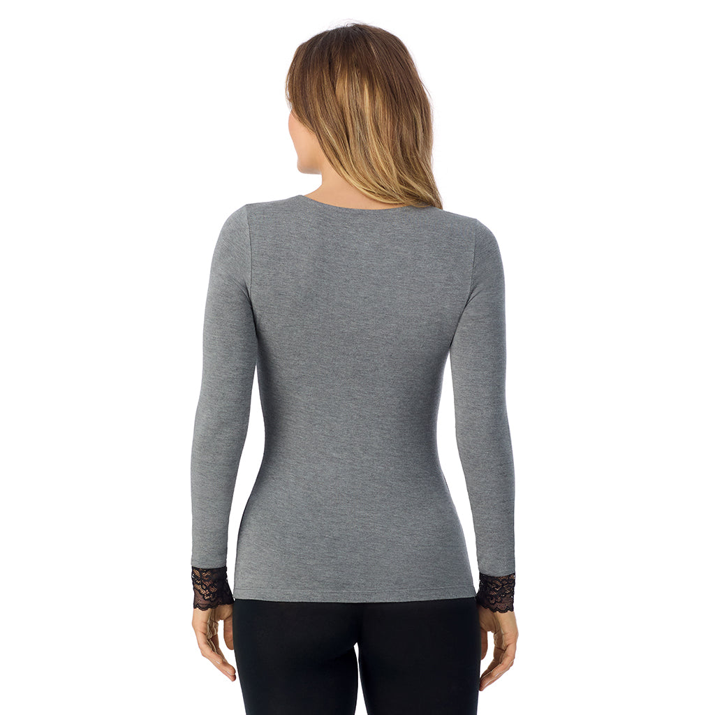 A lady is wearing Softwear With Stretch Long Sleeve V-Neck With Lace
