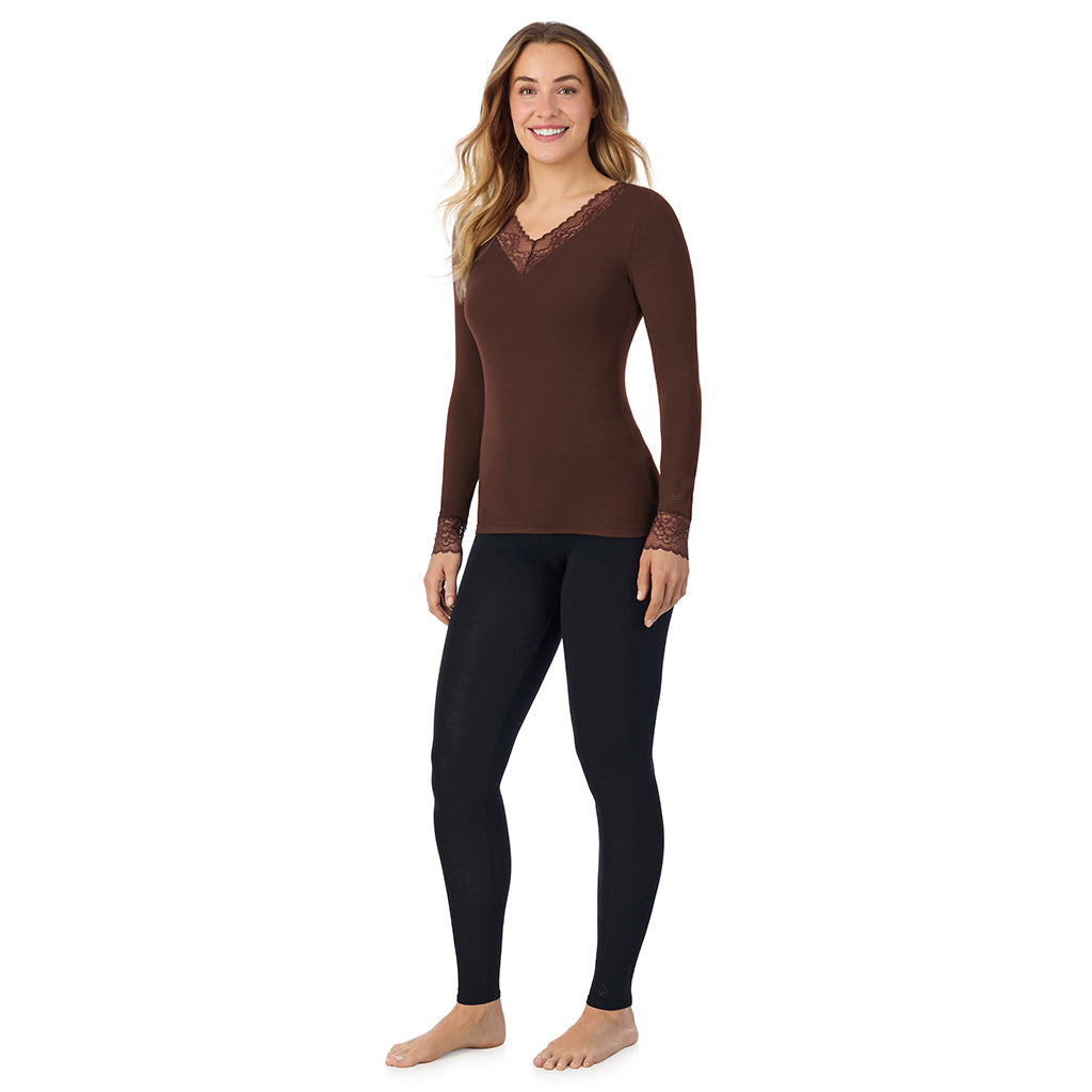 A lady is wearing Softwear With Stretch Long Sleeve V-Neck With Lace
