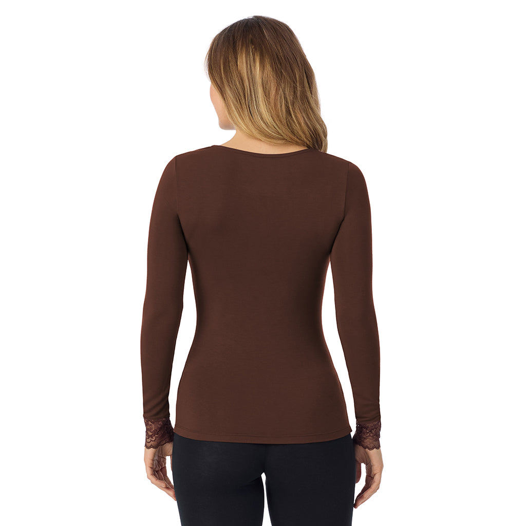 A lady is wearing Softwear With Stretch Long Sleeve V-Neck With Lace
