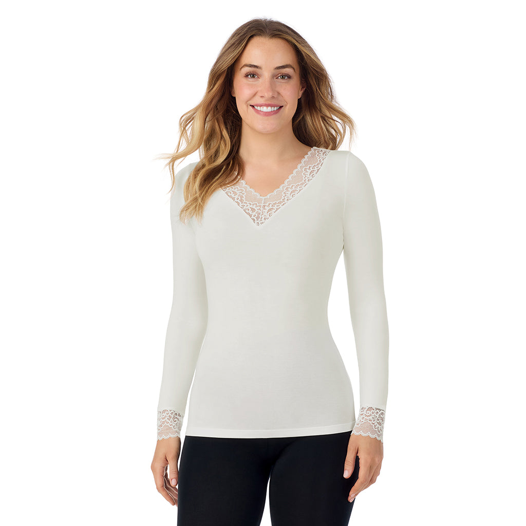 A lady is wearing Softwear With Stretch Long Sleeve V-Neck With Lace
