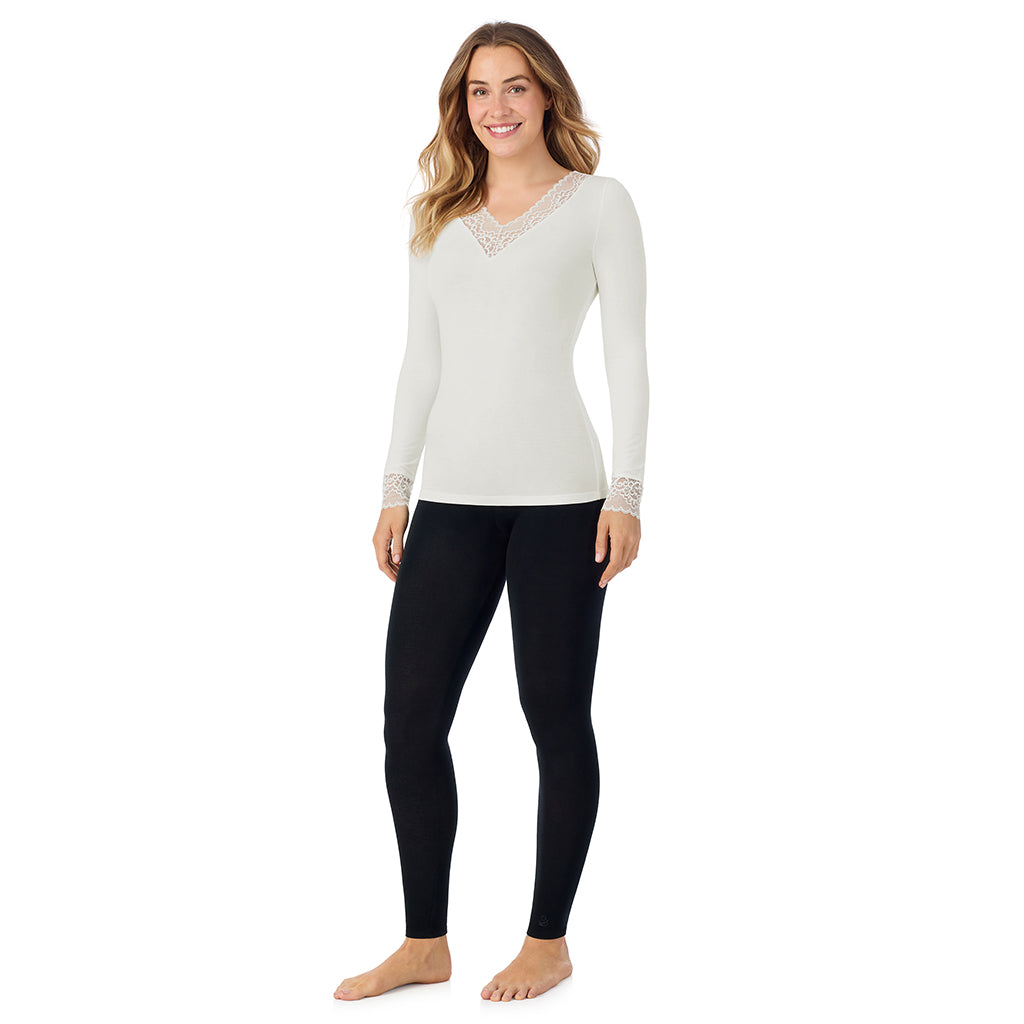 A lady is wearing Softwear With Stretch Long Sleeve V-Neck With Lace
