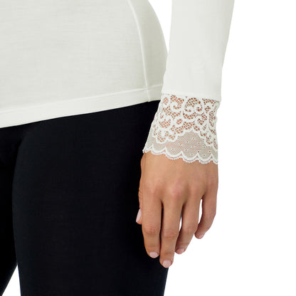Ivory;Model is wearing size S. She is 5'11.5", Bust 34", Waist 26", Hips 37".@A lady is wearing Softwear With Stretch Long Sleeve V-Neck With Lace

