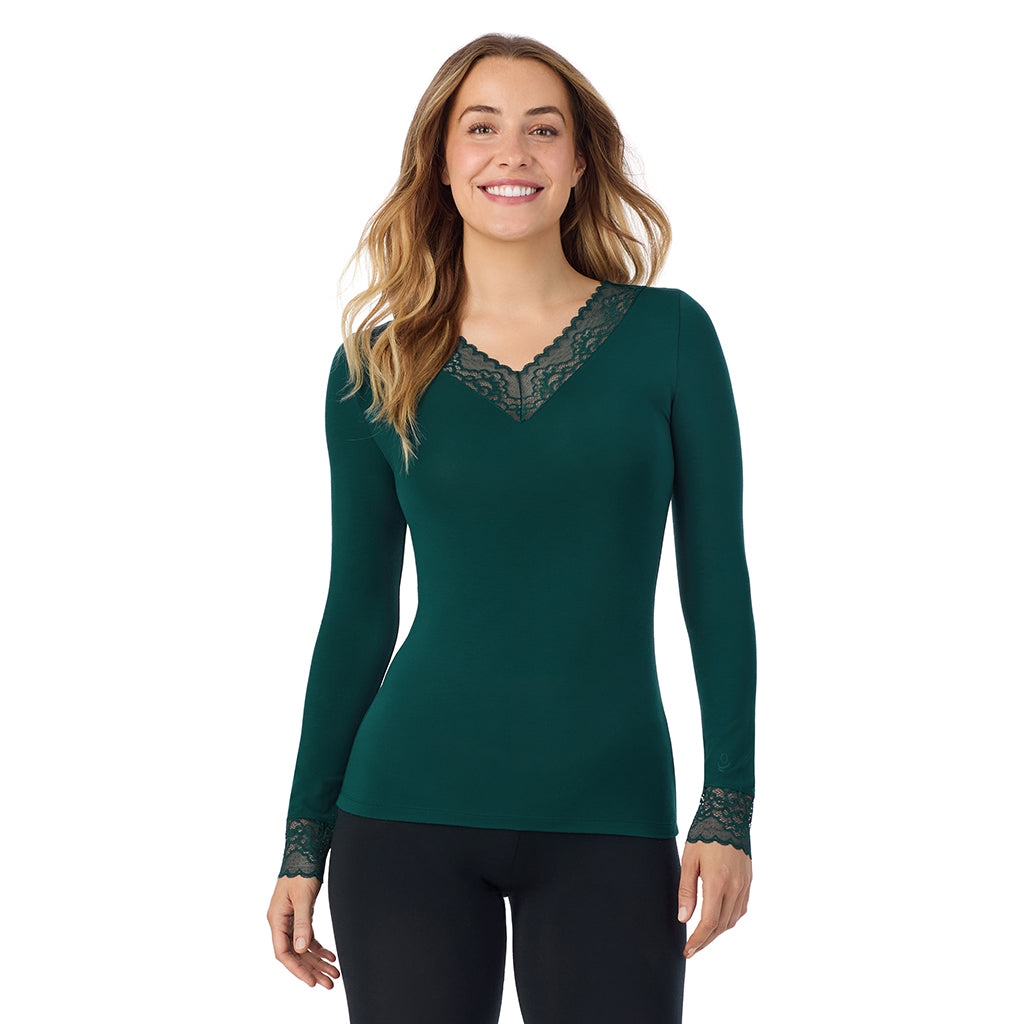 A lady is wearing Softwear With Stretch Long Sleeve V-Neck With Lace
