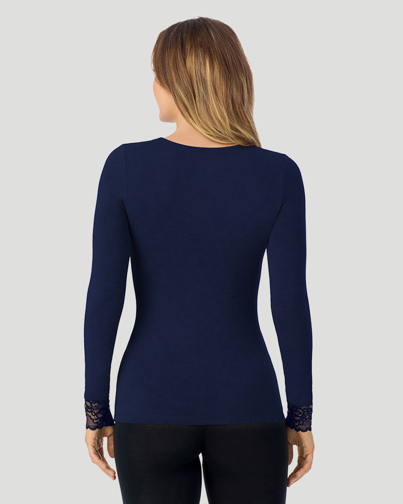 A lady wearing Softwear With Stretch Long Sleeve V-Neck With Lace in navy blazer shown in a back view pose