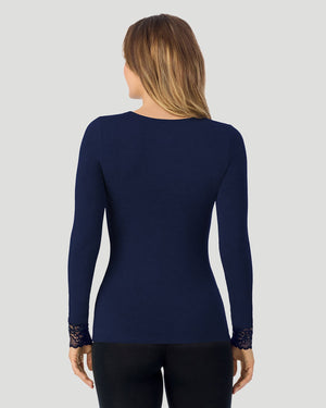  A lady wearing a Deep Emerald Softwear With Stretch Legging in a back view pose