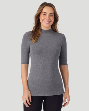 A lady wearing Softwear With Stretch Elbow Sleeve Mock Neck in charcoal heather shown in a front view pose