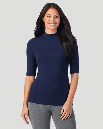 A lady wearing Softwear With Stretch Elbow Sleeve Mock Neck in navy blazer shown in a front view pose