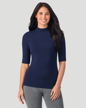 A lady wearing Softwear With Stretch Elbow Sleeve Mock Neck in navy blazer shown in a front view pose