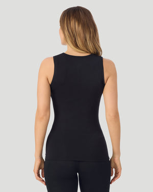 A lady wearing Softwear With Stretch Crew Neck Tank With Lace in black shown in a back view pose