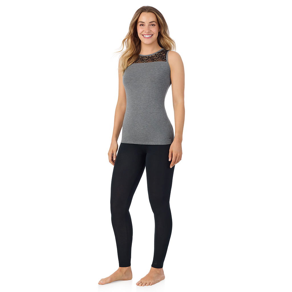 A lady is wearing Softwear with Stretch Crew Neck Tank with Lace
