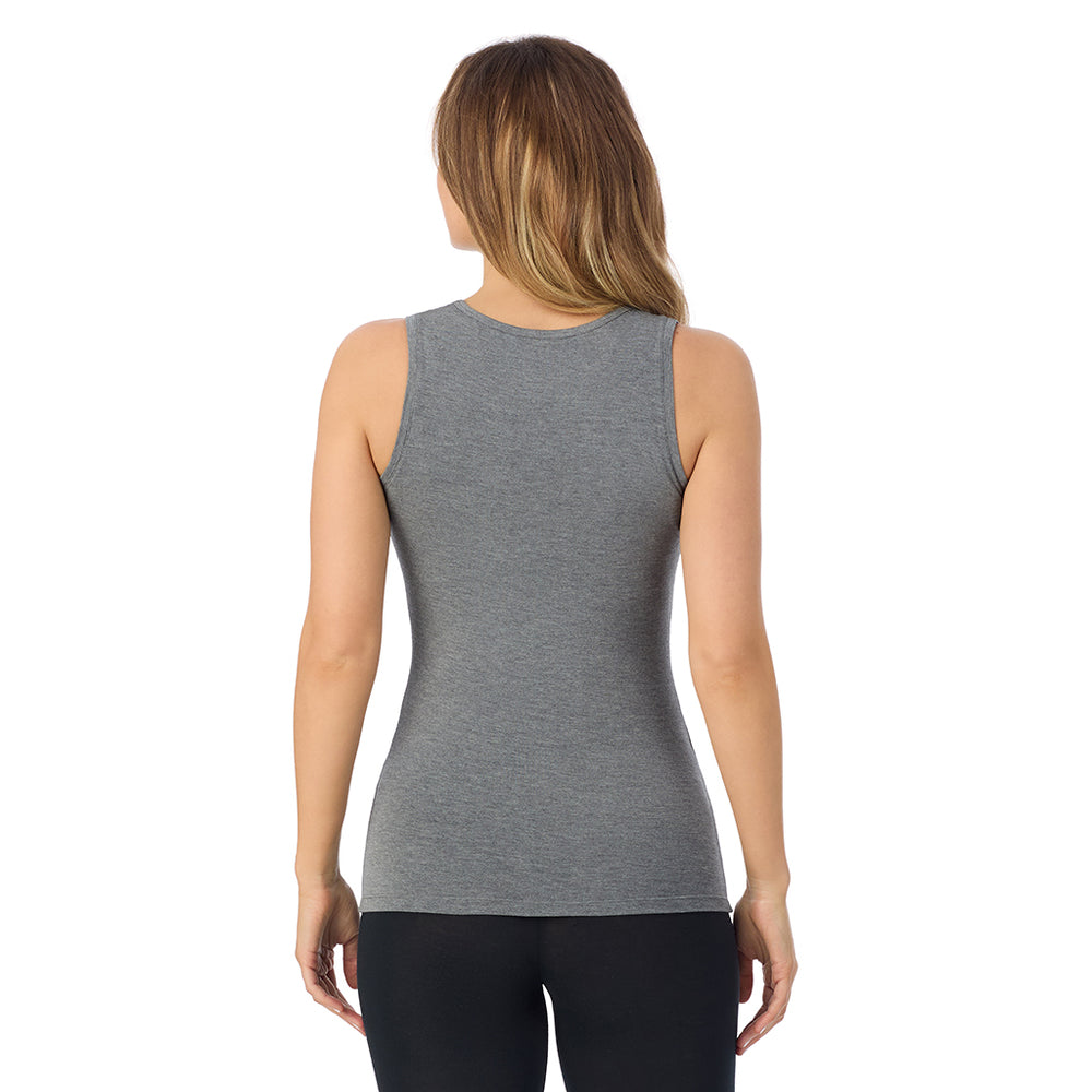 A lady is wearing Softwear with Stretch Crew Neck Tank with Lace