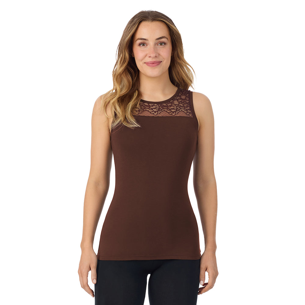 A lady is wearing Softwear with Stretch Crew Neck Tank with Lace