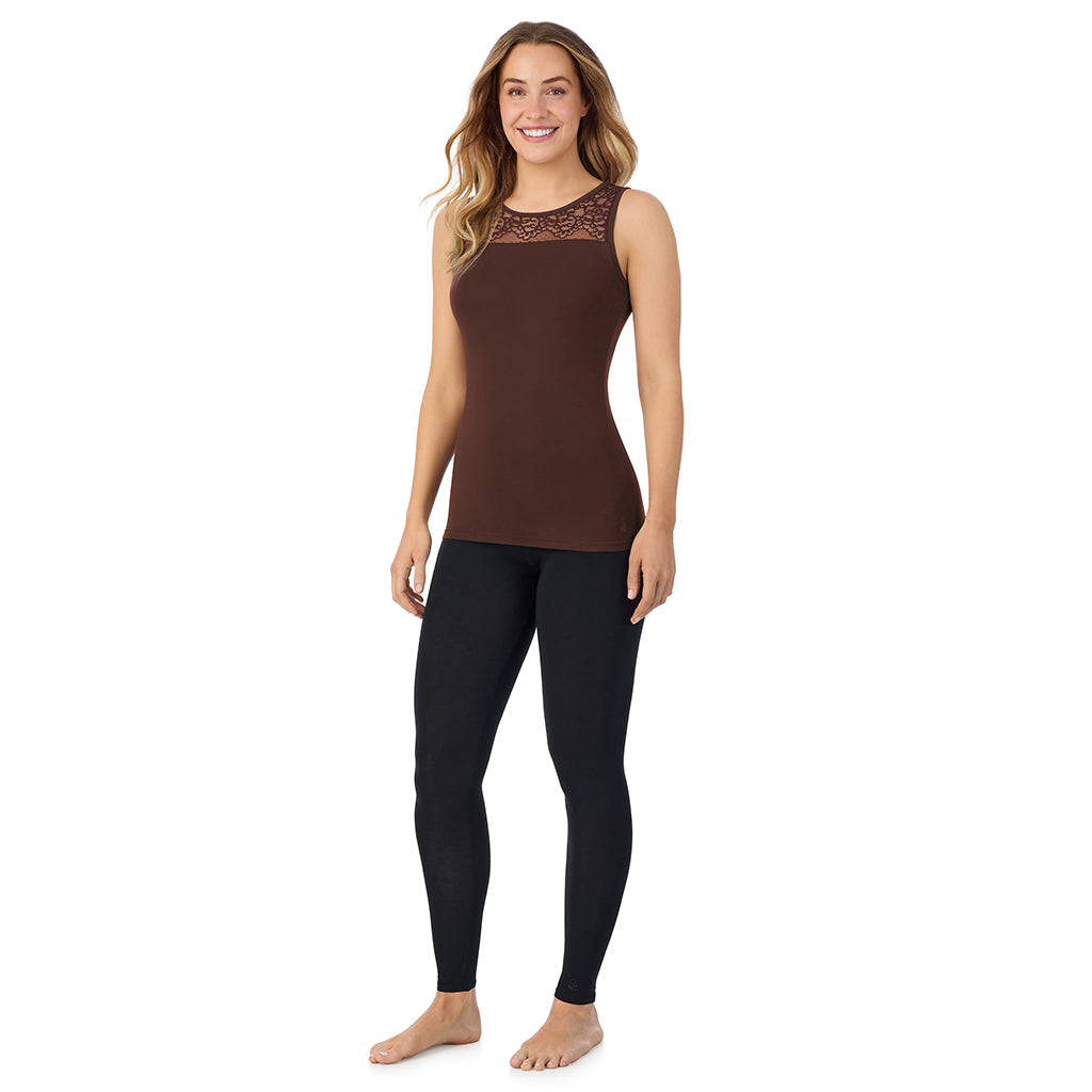A lady is wearing Softwear with Stretch Crew Neck Tank with Lace
