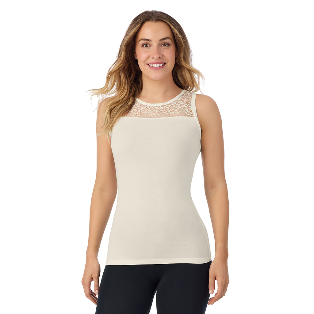 A lady is wearing Softwear with Stretch Crew Neck Tank with Lace
