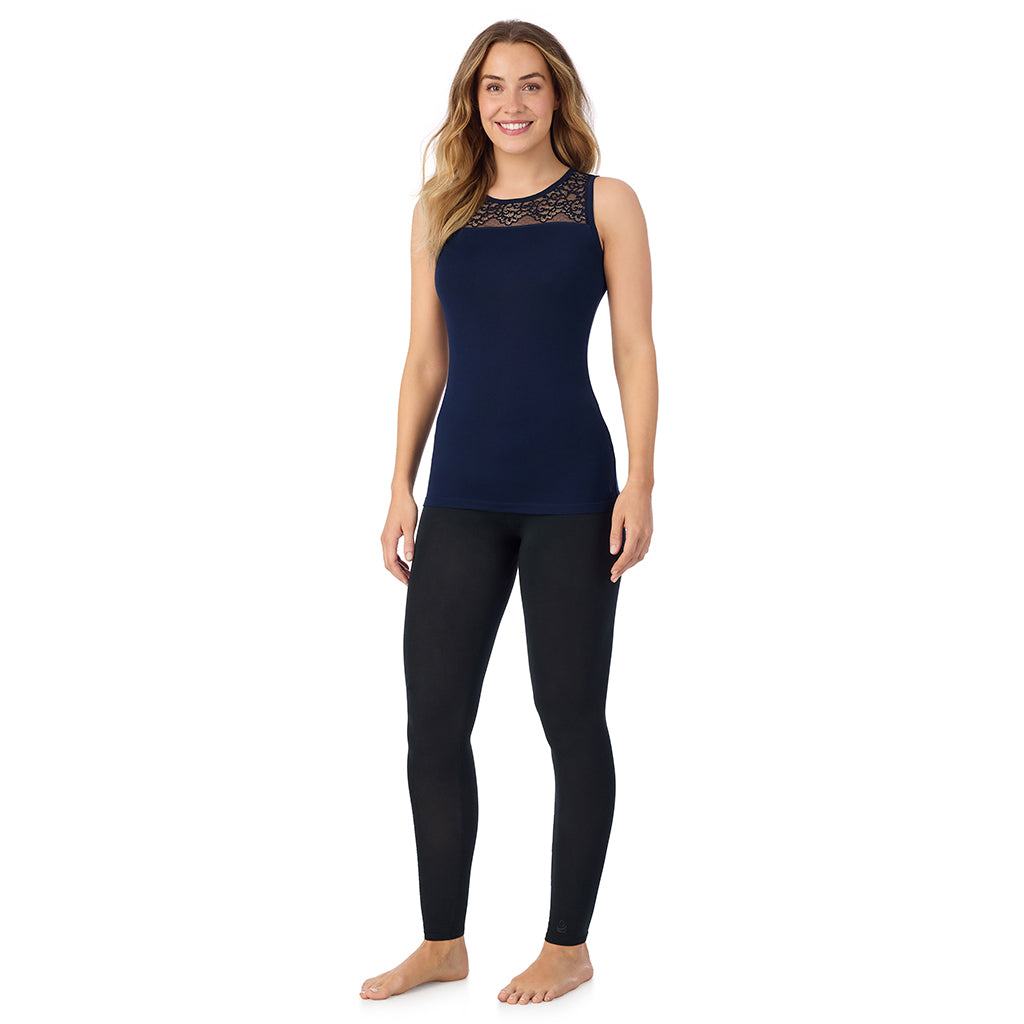 A lady is wearing Softwear with Stretch Crew Neck Tank with Lace
