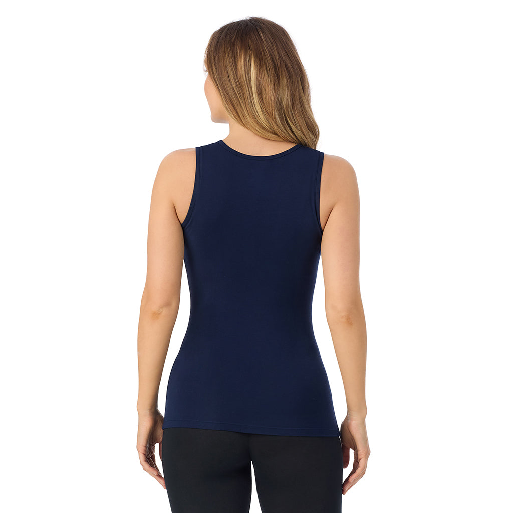 A lady is wearing Softwear with Stretch Crew Neck Tank with Lace
