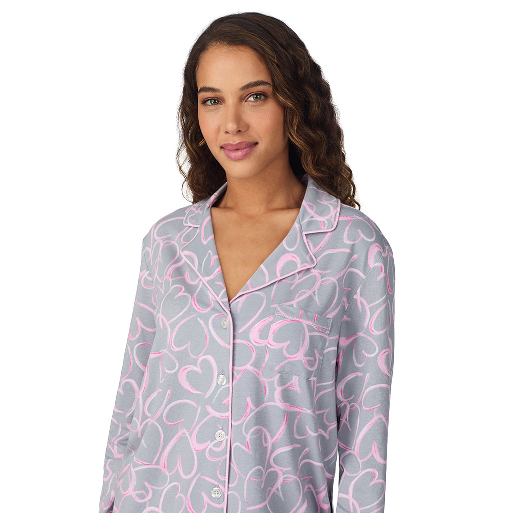 A lady wearing Grey Scribble Hearts Cotton-Blend Long Sleeve Notch Collar 2-Pc Pajama Set