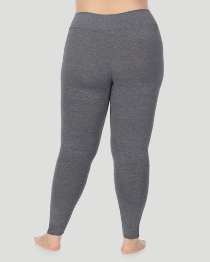 A plus size lady wearing Softwear With Stretch High Waist Legging PLUS in charcoal heather in a back view pose 