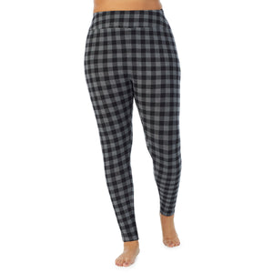A lady wearing a Grey Tonal Buffalo high waist legging plus.