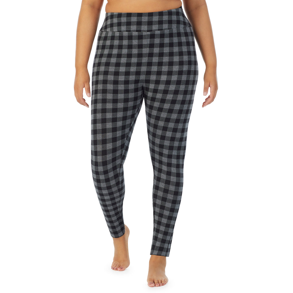 A lady wearing a Grey Tonal Buffalo high waist legging plus.