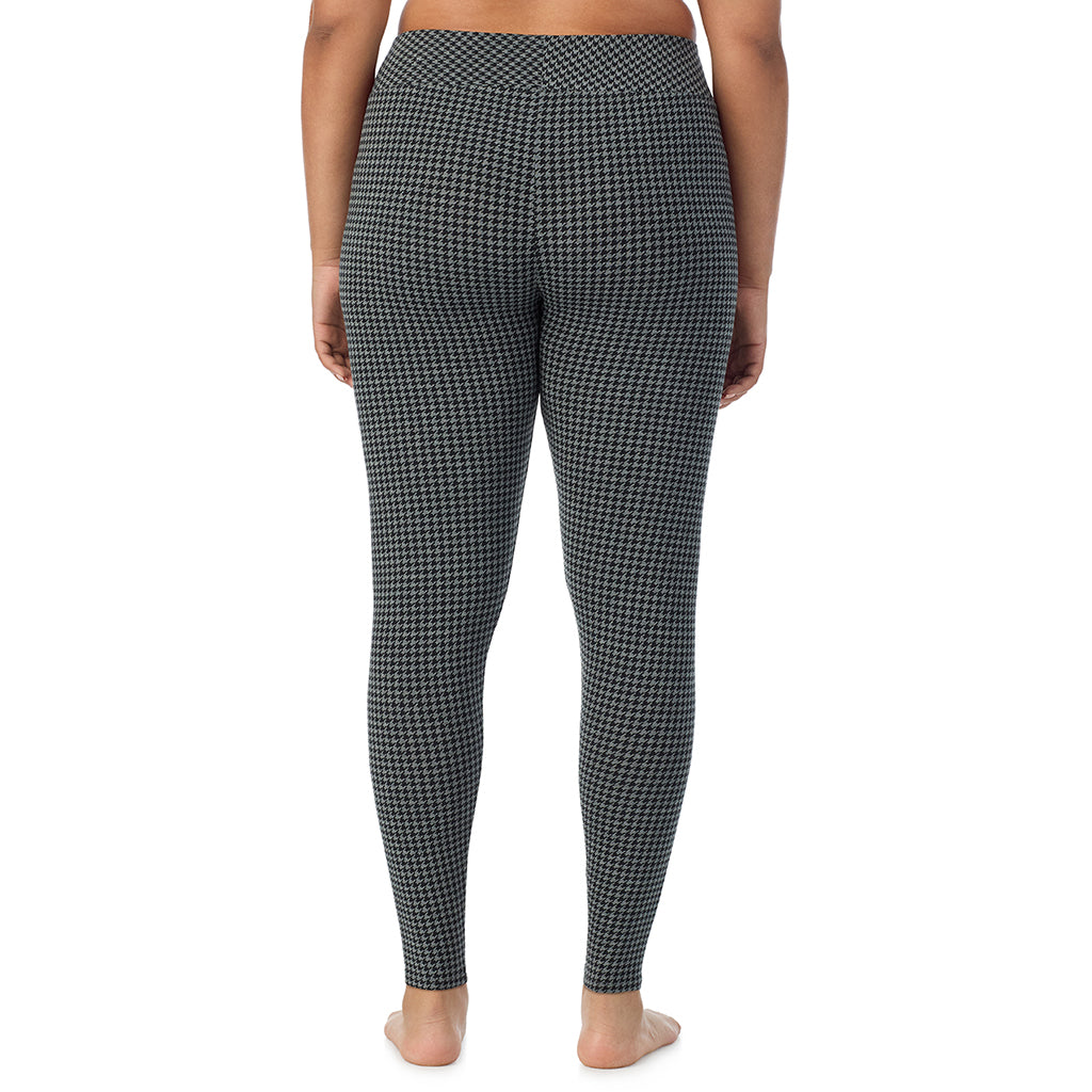 A lady wearing a charcoal heather houndsooth high waist legging plus.