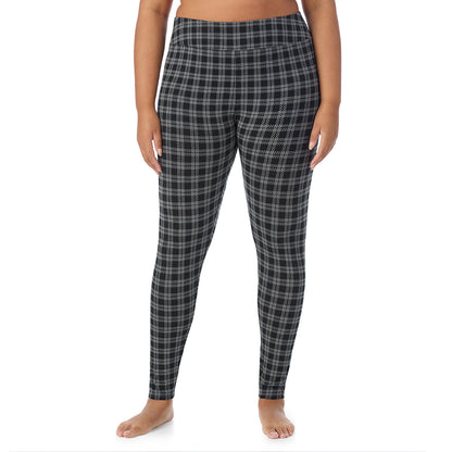 Charcoal/Black Plaid; Model is wearing size 1X. She is 5'11", Bust 36", Waist 36.5", Hips 47.5".@A lady wearing a Charcoal/Black Plaid high waist legging plus.
