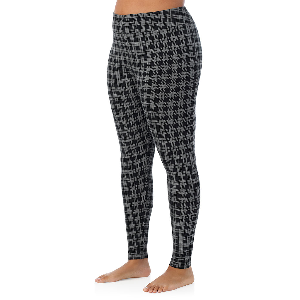 A lady wearing a Charcoal/Black Plaid high waist legging plus.
