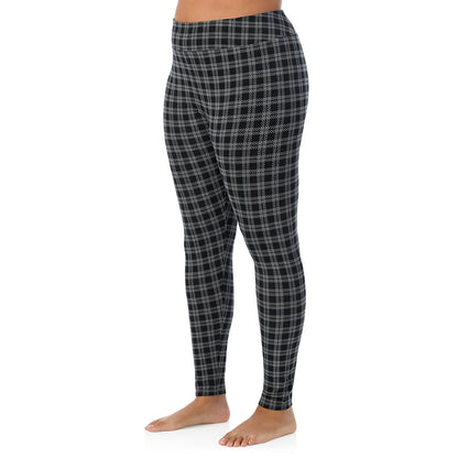 Charcoal/Black Plaid; Model is wearing size 1X. She is 5'11", Bust 36", Waist 36.5", Hips 47.5".@A lady wearing a Charcoal/Black Plaid high waist legging plus.