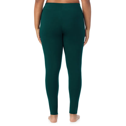 Dark Pine; Model is wearing size 1X. She is 5'11", Bust 36", Waist 36.5", Hips 47.5".@A lady wearing a dark pine high waist legging plus.