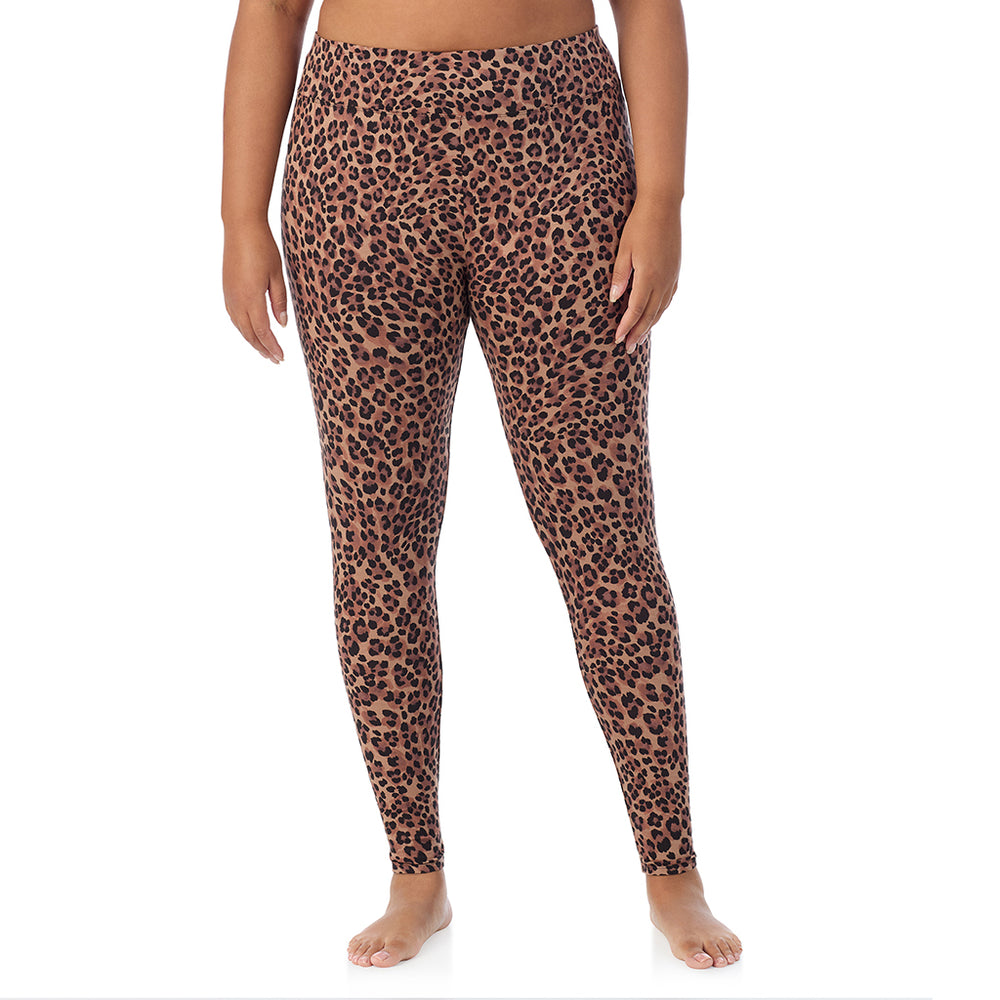 A lady wearing a taupe leopard high waist legging plus.