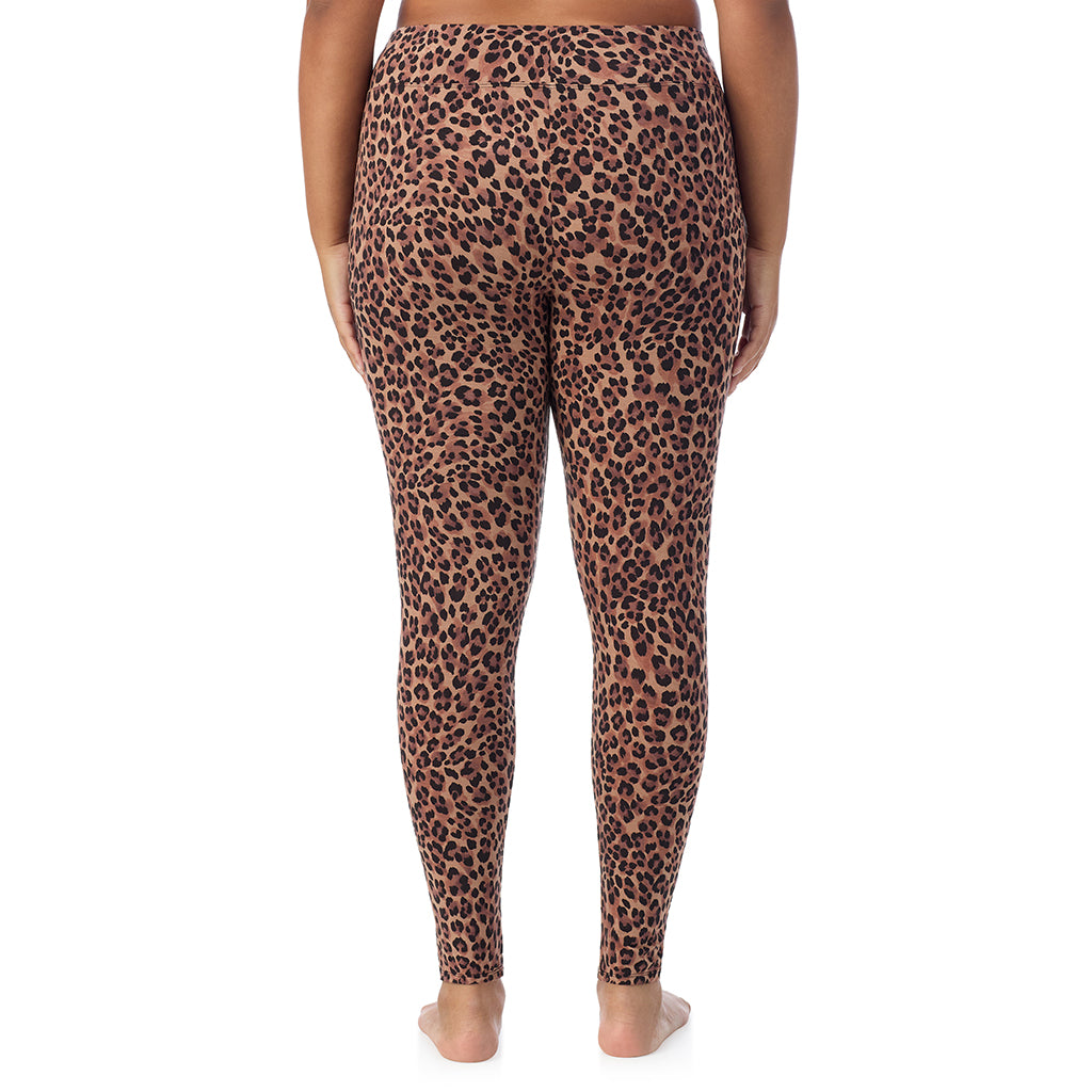 A lady wearing a taupe leopard high waist legging plus.