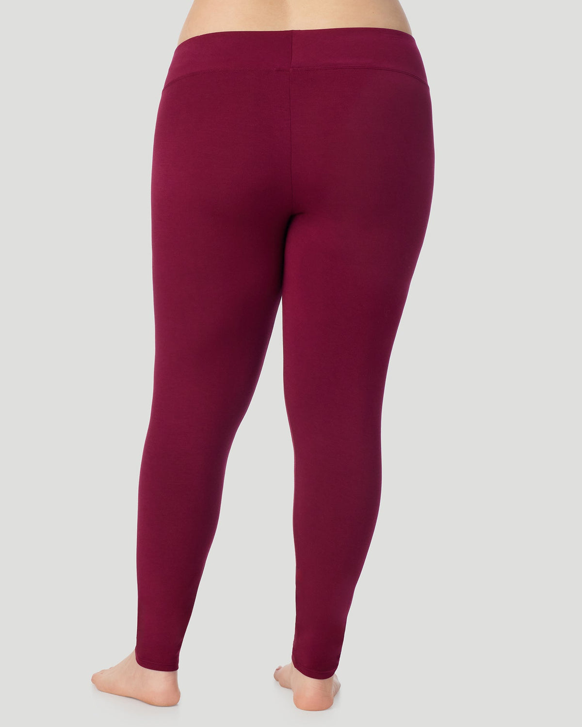 Scarlet; Model is wearing size 1X. She is 5'10", Bust 44", Waist 36", Hips 49". @A plus size lady wearing Softwear With Stretch High Waist Legging PLUS in scarlet in a back view pose
