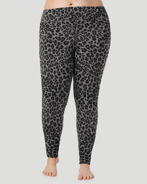 A plus size lady wearing Softwear With Stretch High Waist Legging PLUS in charcoal leopard in a front view pose