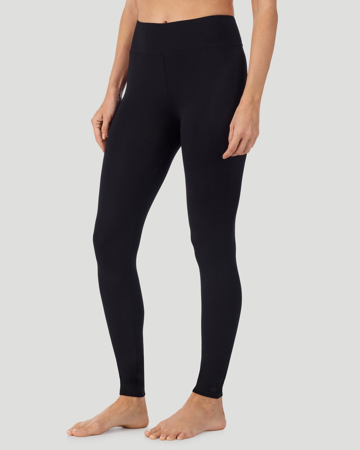 Black; Model is wearing a size S. She is 5’11.5”, Bust 34”, Waist 27”, Hips 38.5”.  @A lady wearing Softwear With Stretch High Waist Legging in black in a front view side angle pose