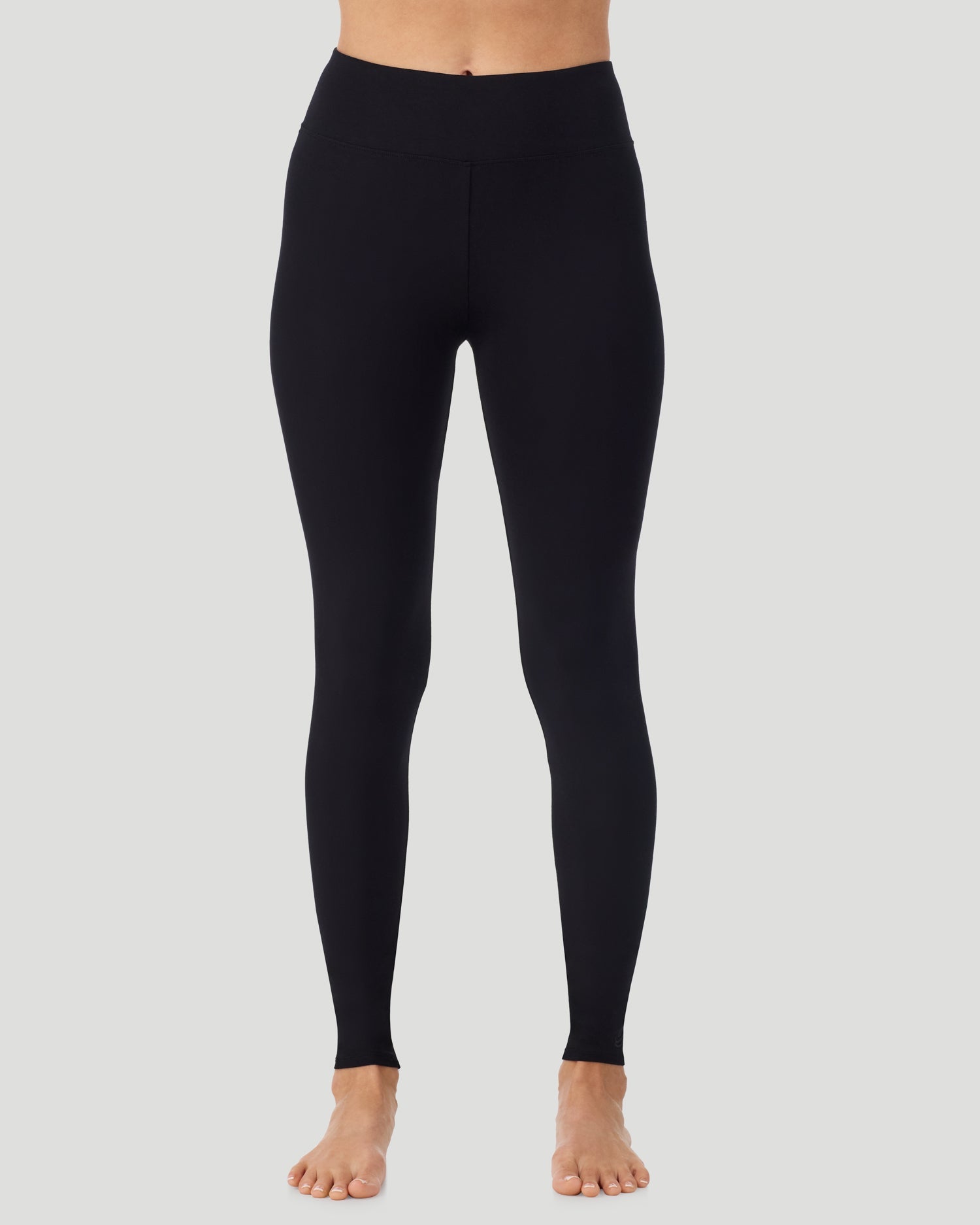 A lady wearing Softwear With Stretch High Waist Legging in black in a front view pose