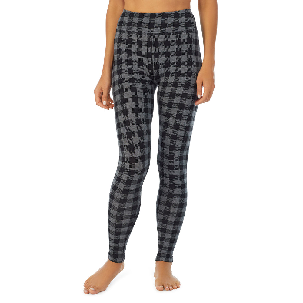 A lady wearing a Grey Tonal Buffalo high waist legging.