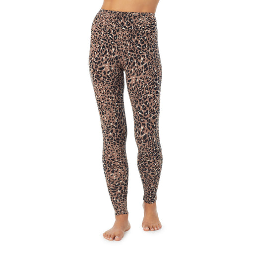 Pecan Leopard; Model is wearing size S. She is 5’9”, Bust 34”, Waist 25.5”, Hips 36.5”. @A lady wearing a Pecan Leopard high waist legging.
