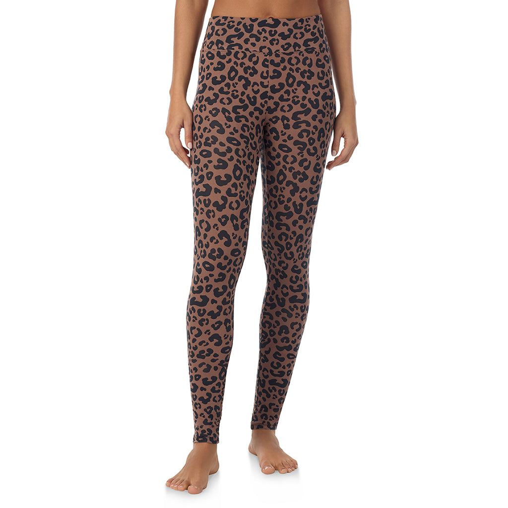 A lady wearing a pecan animal high waist legging.