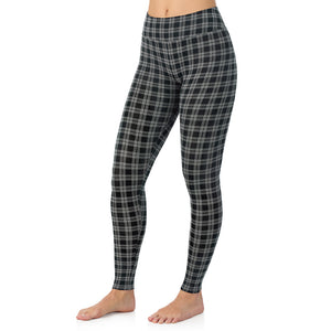 A lady wearing a charcoal/black plaid high waist legging.