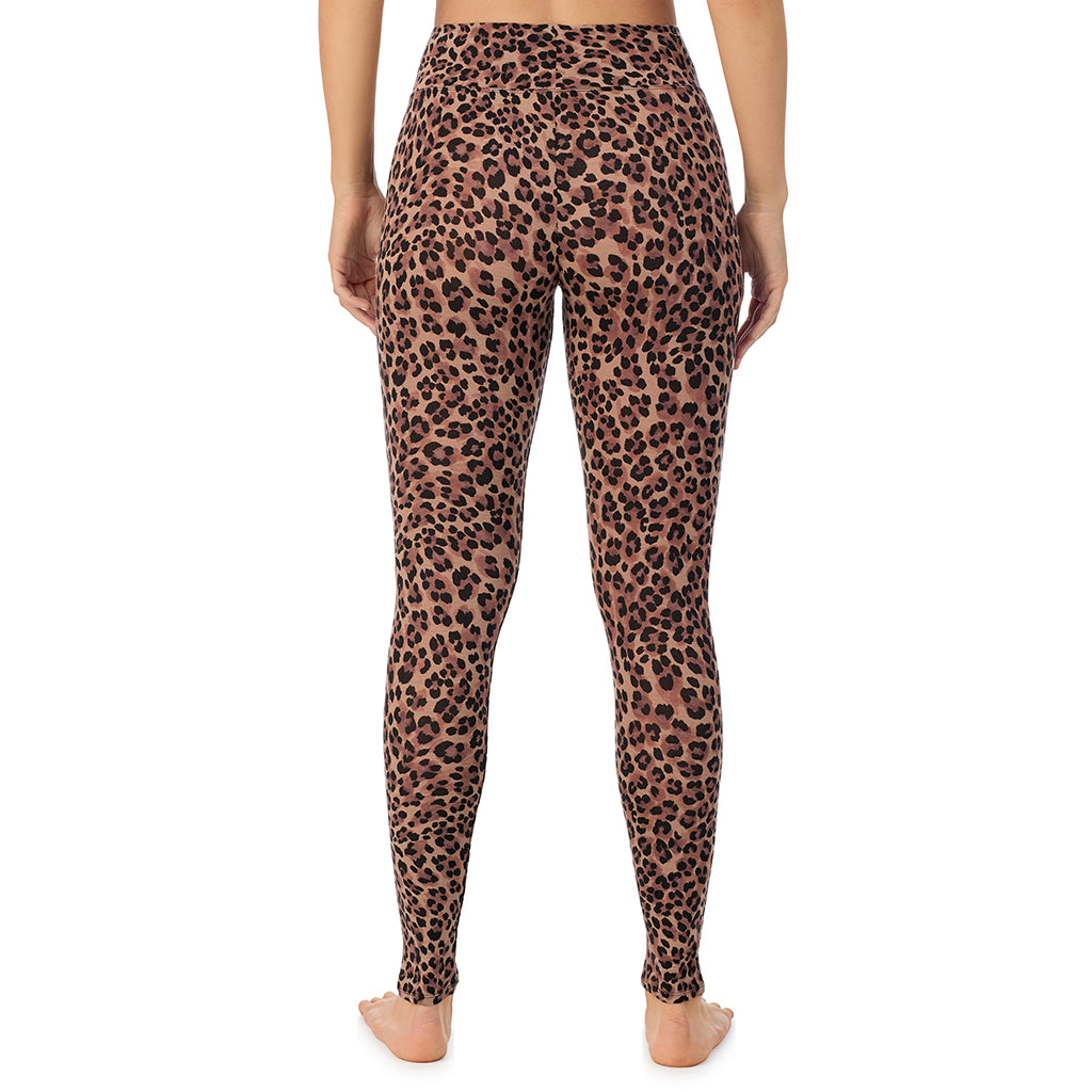 A lady wearing a taupe leopard high waist legging.